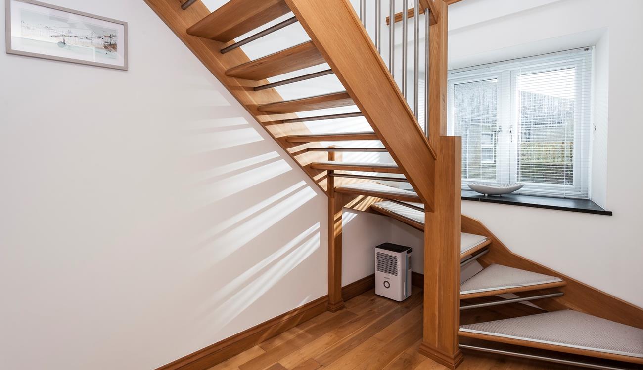 We love how the open staircase allows the light to stream through.
