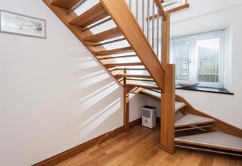 We love how the open staircase allows the light to stream through.