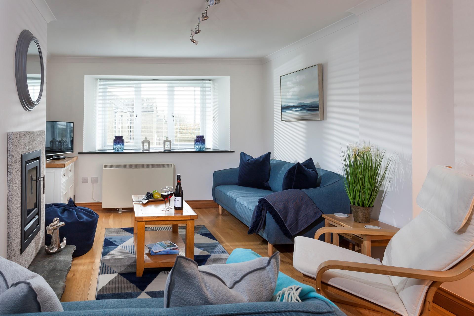 Elegantly finished, the light and airy sitting room is the perfect place to unwind together at the end of a busy day exploring south west Cornwall.