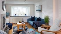 Elegantly finished, the light and airy sitting room is the perfect place to unwind together at the end of a busy day exploring south west Cornwall.