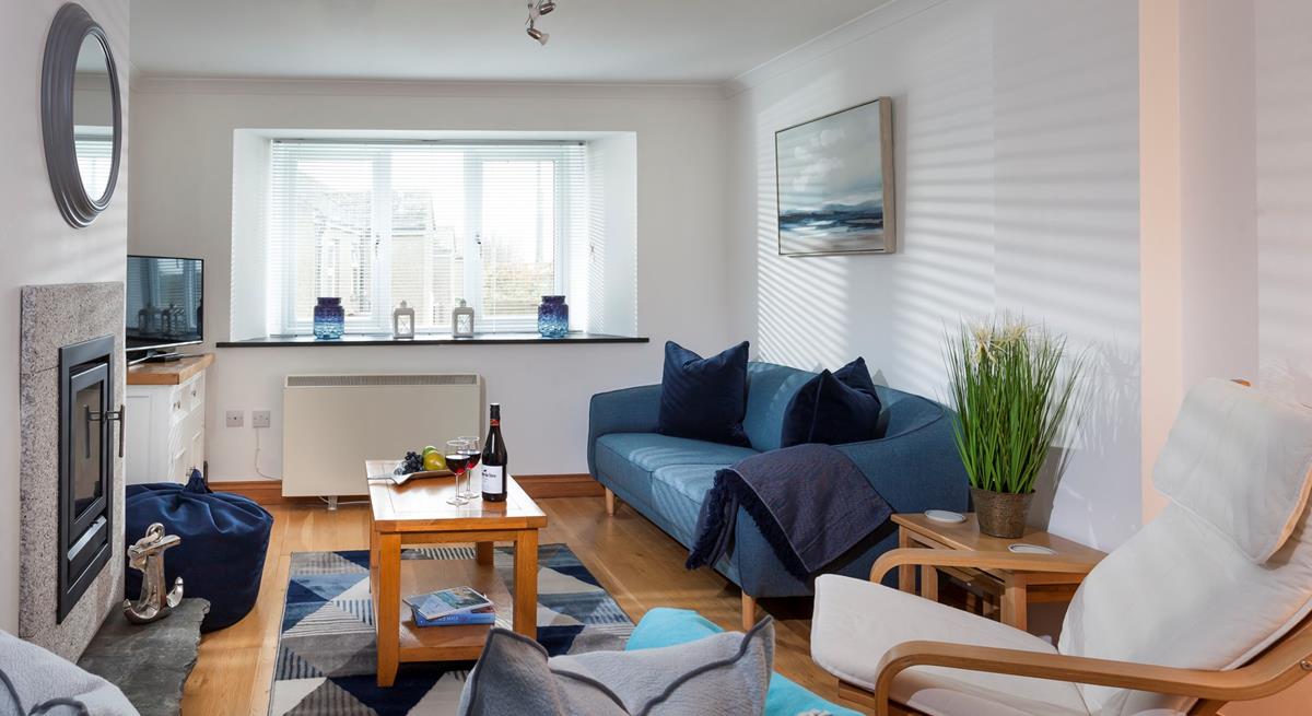 Elegantly finished, the light and airy sitting room is the perfect place to unwind together at the end of a busy day exploring south west Cornwall.