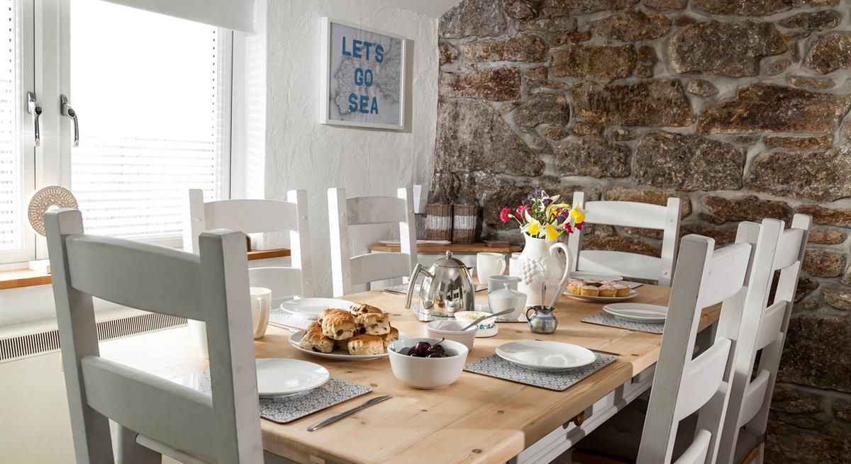 Gather together for a Cornish cream tea in the light and airy dining area. 