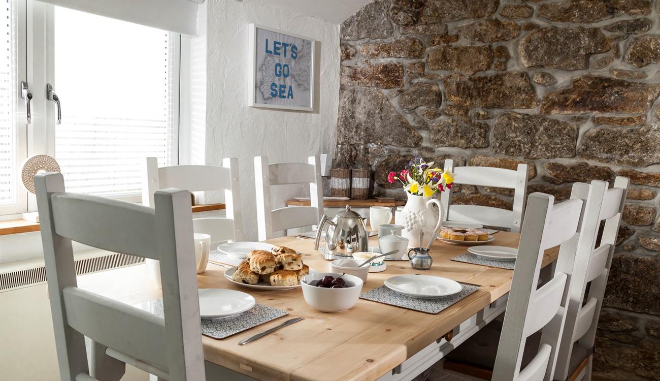 Gather together for a Cornish cream tea in the light and airy dining area. 