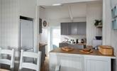 The open plan kitchen diner is well-designed for cooking whilst socialising.  - Thumbnail Image