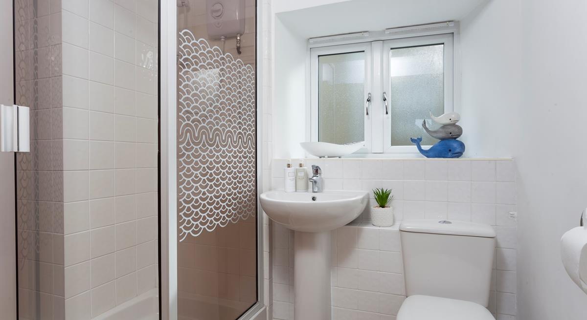 The ground floor shower room is conveniently located for rinsing off those sandy toes after a day at the beach.