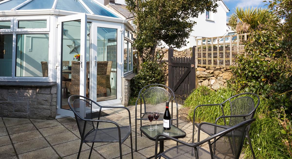 The secluded garden offers a private area for dining al fresco on those balmy summer evenings. 