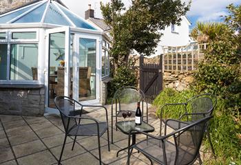 The secluded garden offers a private area for dining al fresco on those balmy summer evenings. 