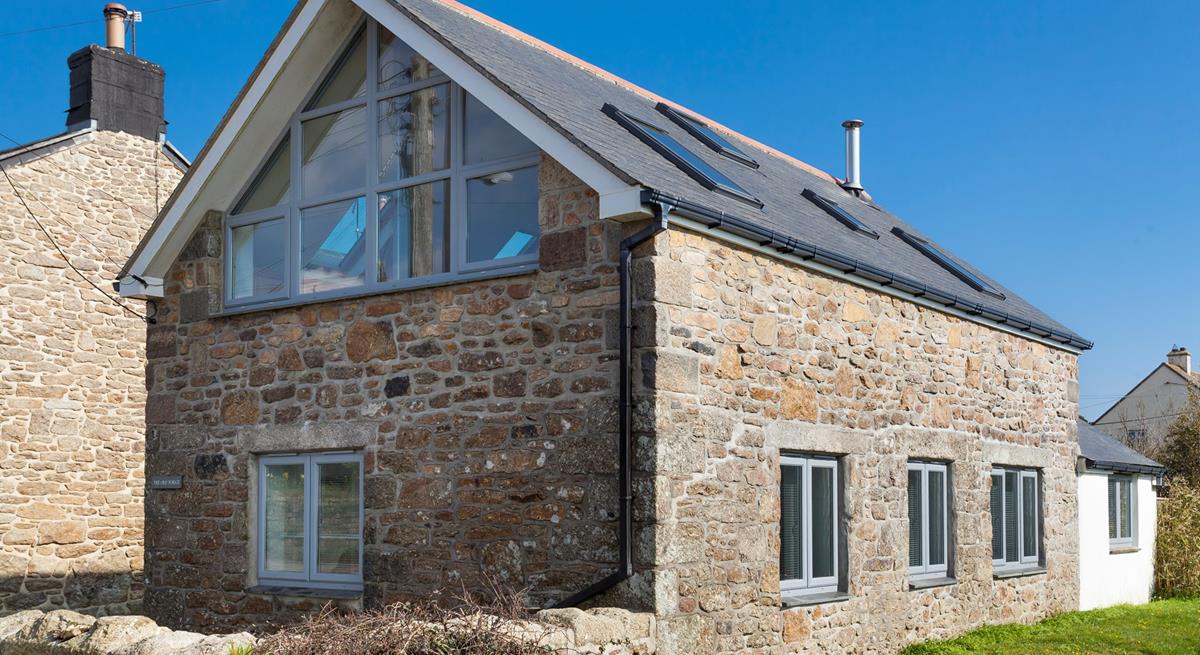 Traditional granite combined with modern features creates a statement on arrival at The Old Forge. 