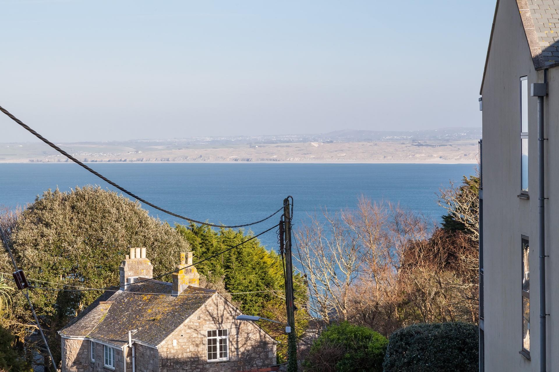 This apartment has sought after sea views across St Ives Bay, for winter getaways you can cosy up and storm watch all day.