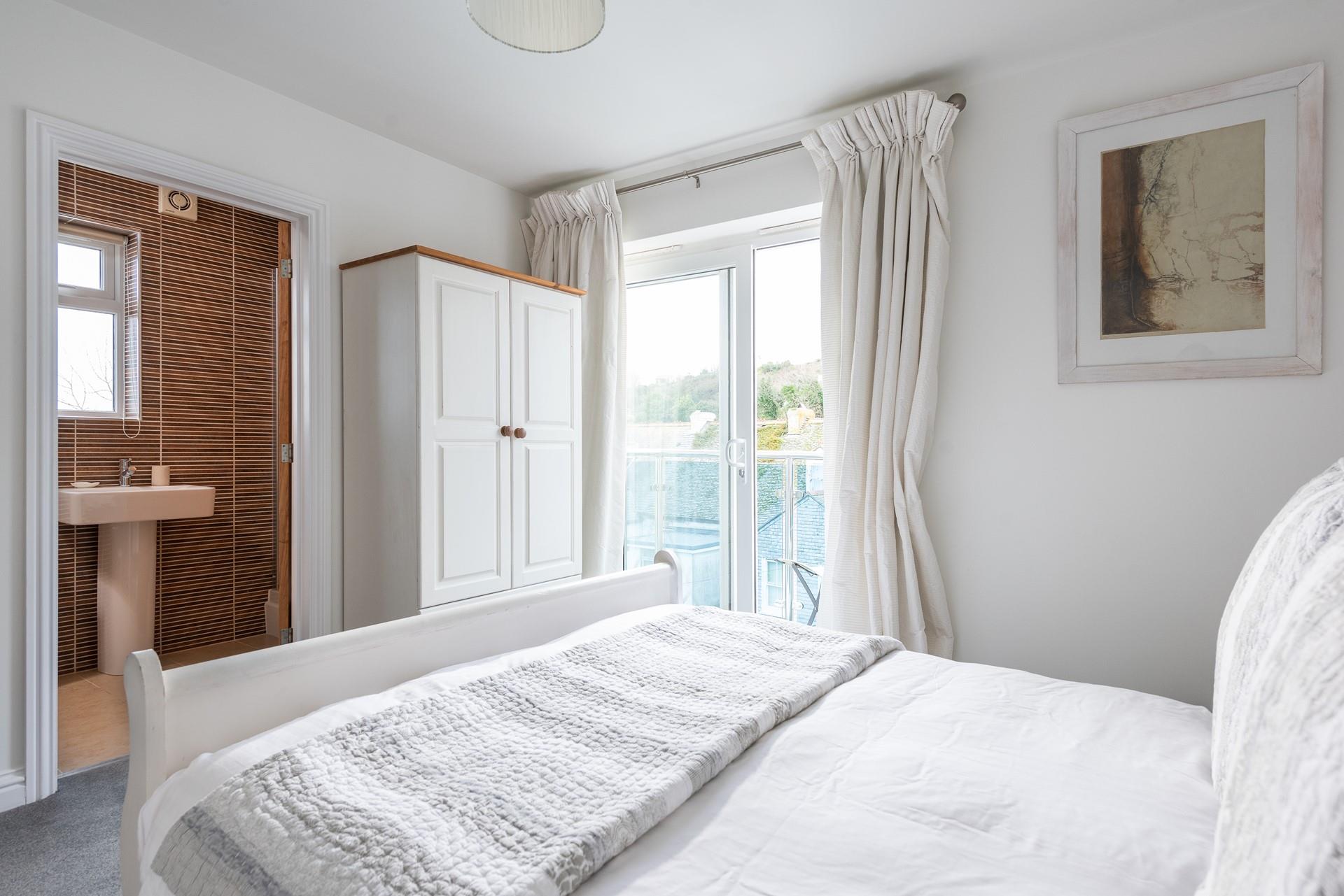 Step out of bed and wake up to sunshine and sea views.