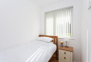 Perfectly proportioned for one person, the single room is light and airy and overlooks the garden. 