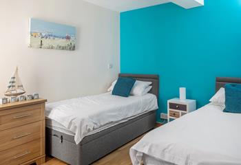 With its twin beds and bright colours, the twin room is perfect for children and adults alike!
