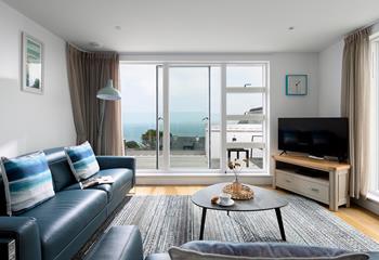 The open plan living space takes advantage of the stunning views across St Ives Bay.