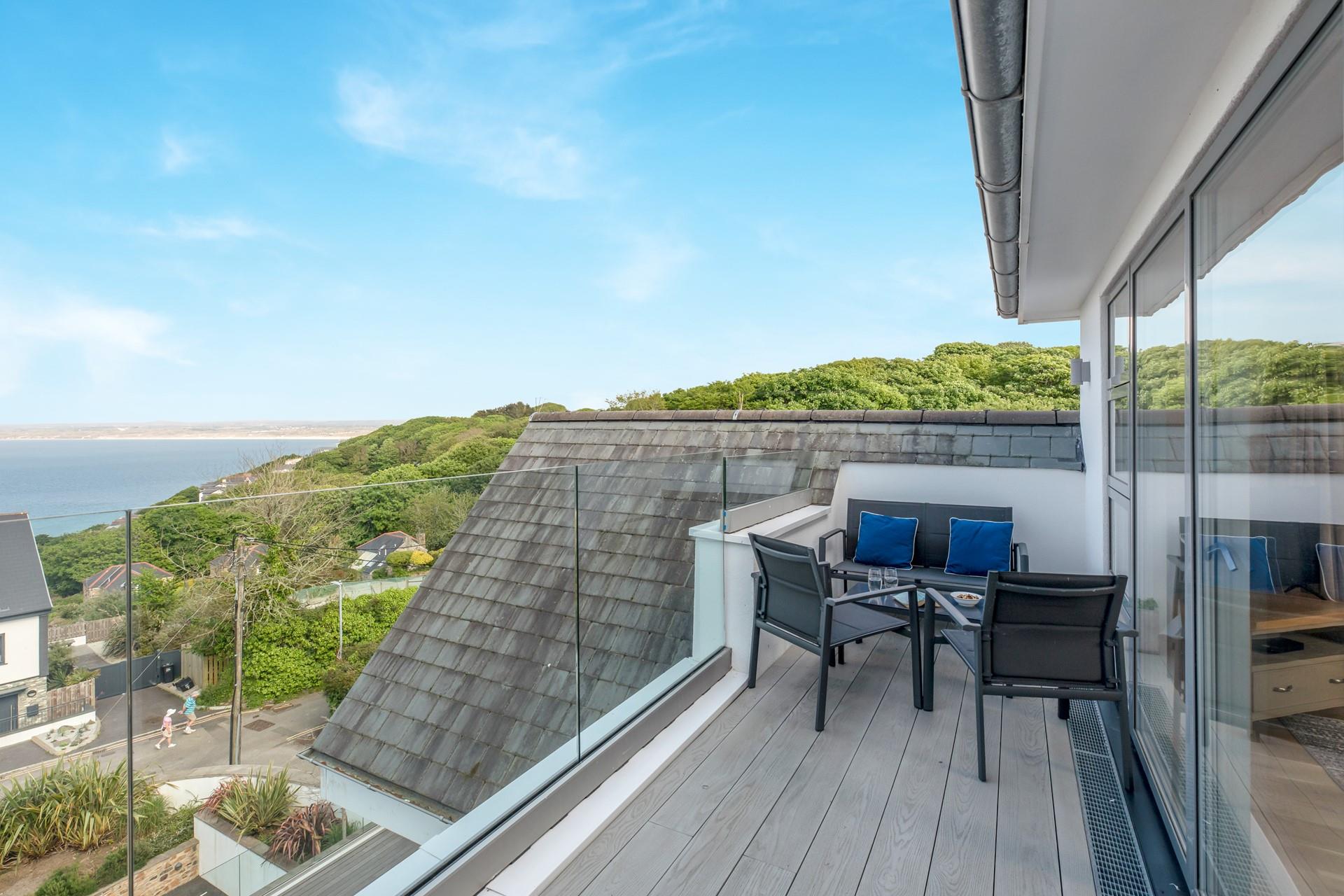 The balcony off the bedroom is the ideal spot for morning coffee or afternoon tipple.