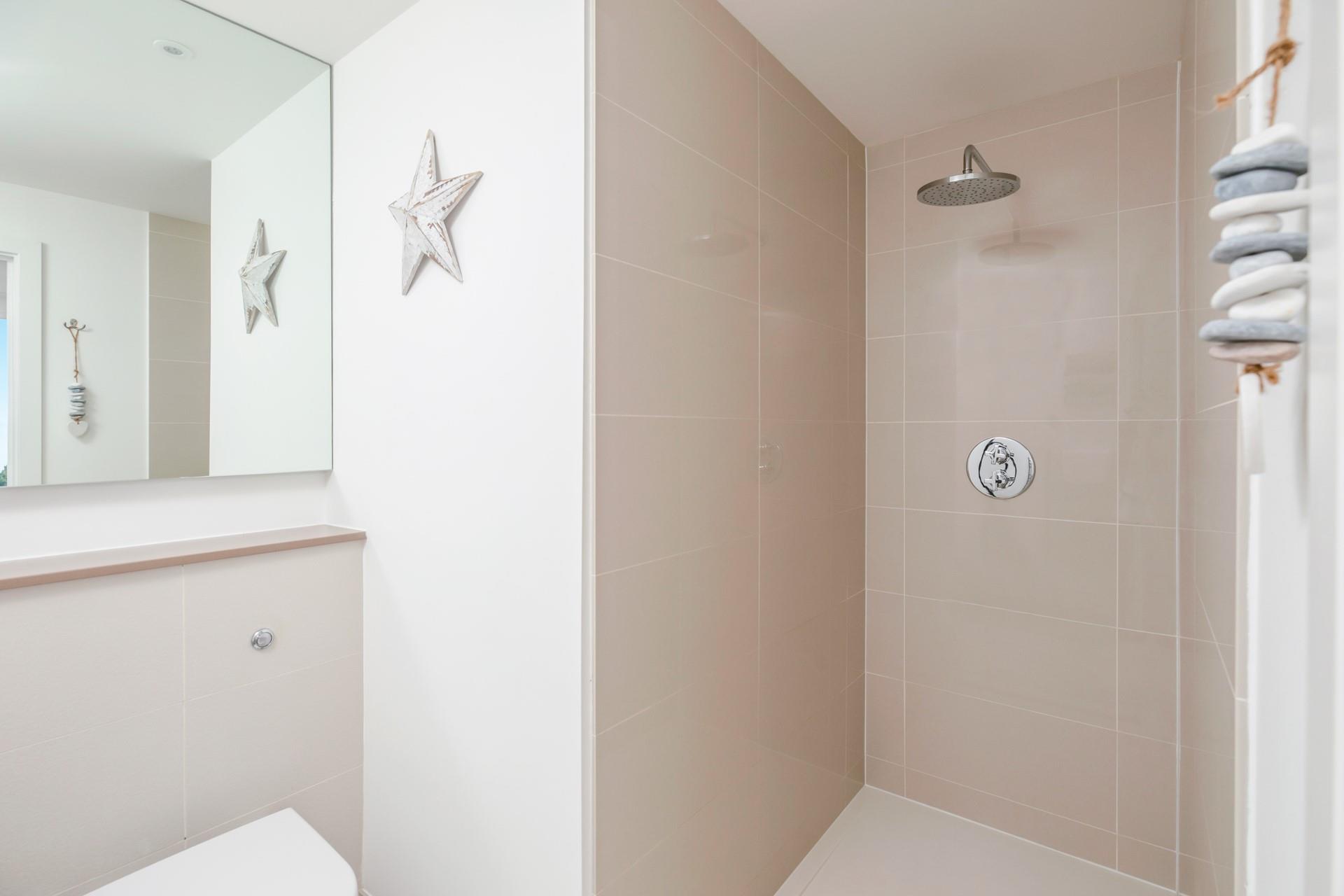 Step out of the shower to warm fluffy towels from the heated rail.