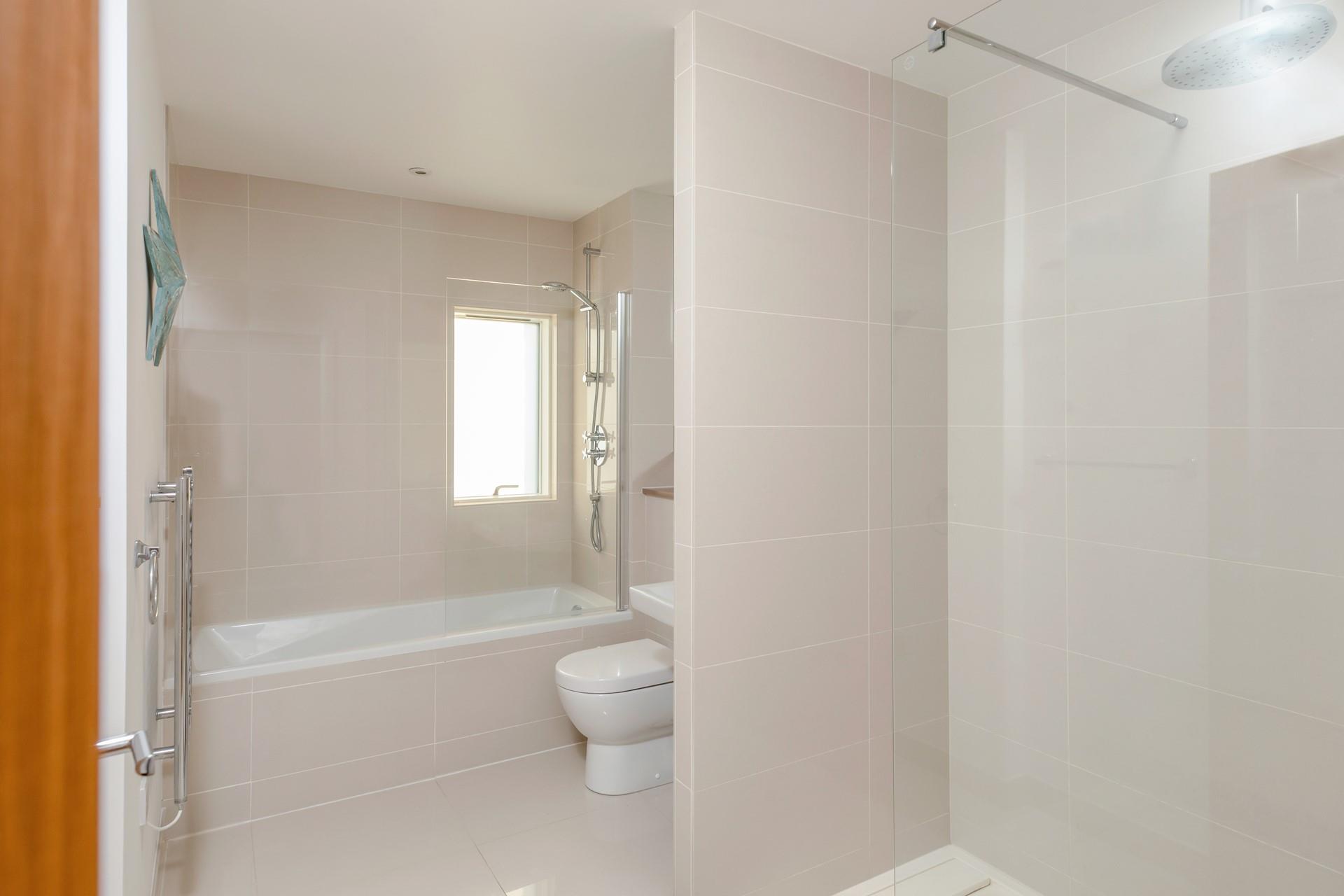 Run a bubble bath to relax and unwind after a coast path ramble.