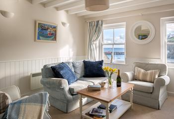 Designed to make the most of the views across the harbour, the sitting room is cleverly positioned on the first floor. 