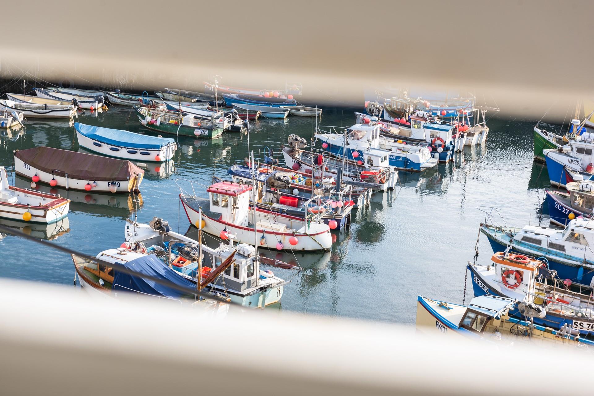 Relish in the views from the first floor sitting room; watch the boats come and go from the harbour. 