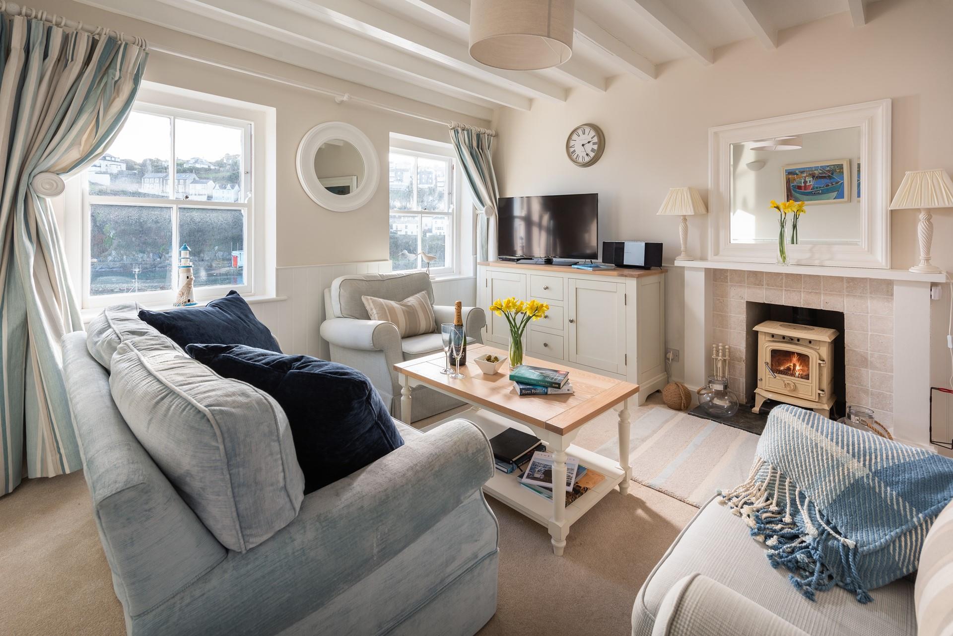 Make memories in the cosy, cottage-style, living area; light the woodburner and share stories of your holiday adventures. 