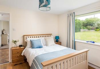 Calming tones of cream and blue feature in bedroom 4.