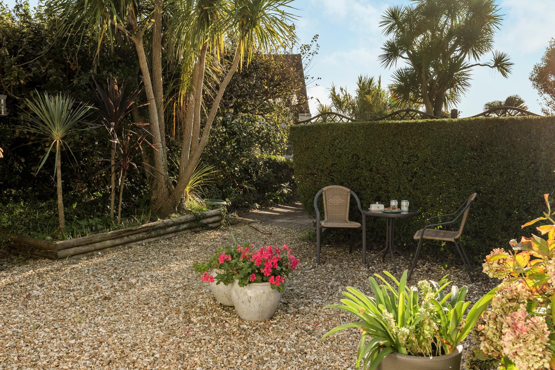 Start the day with a cuppa in the peaceful garden.