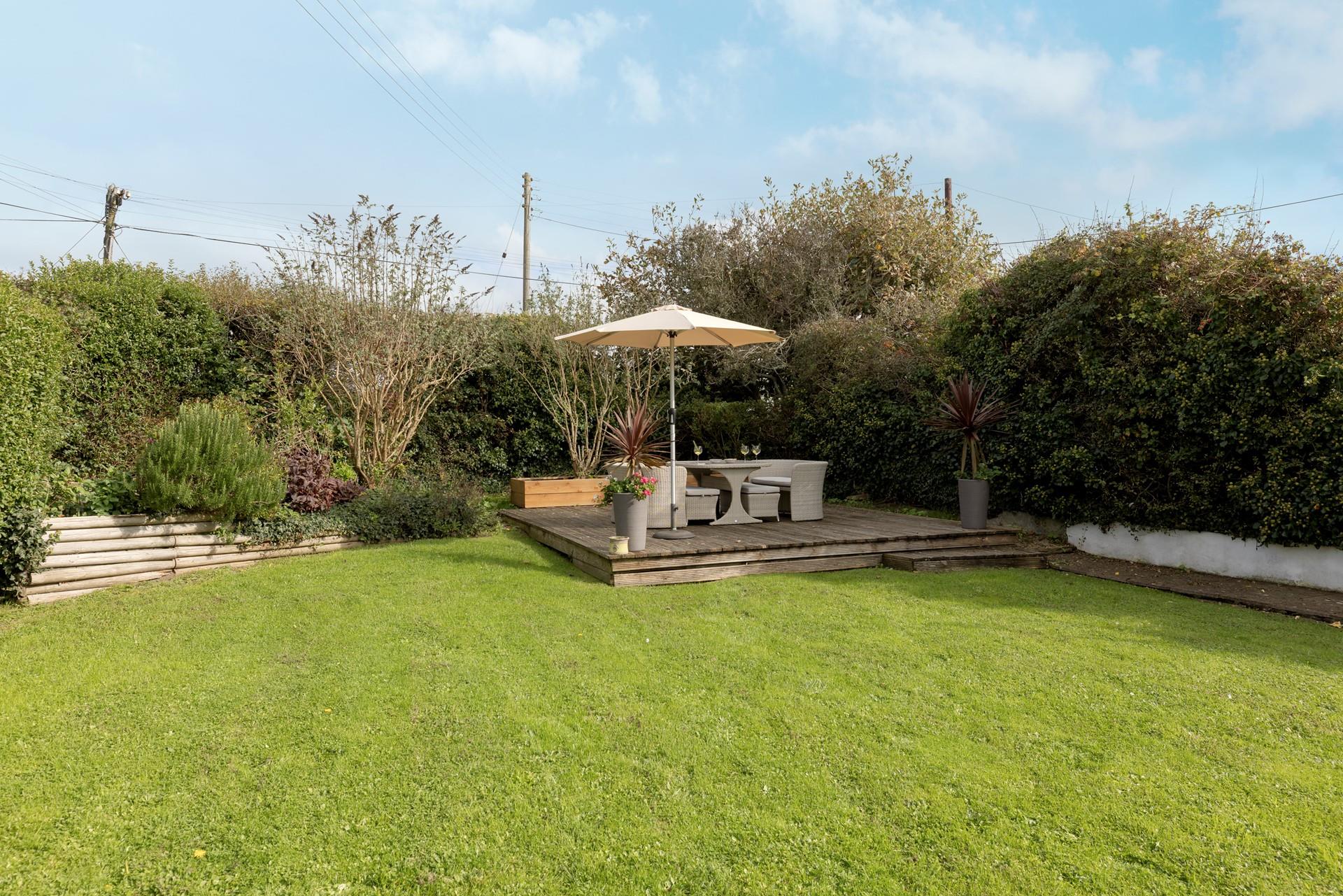 Soak up the sun in the large garden.