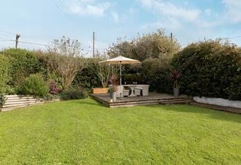 Soak up the sun in the large garden.