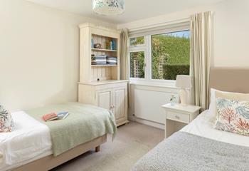 Bedroom 3 is stylishly decorated in pastel tones and is a relaxing base to come back to.
