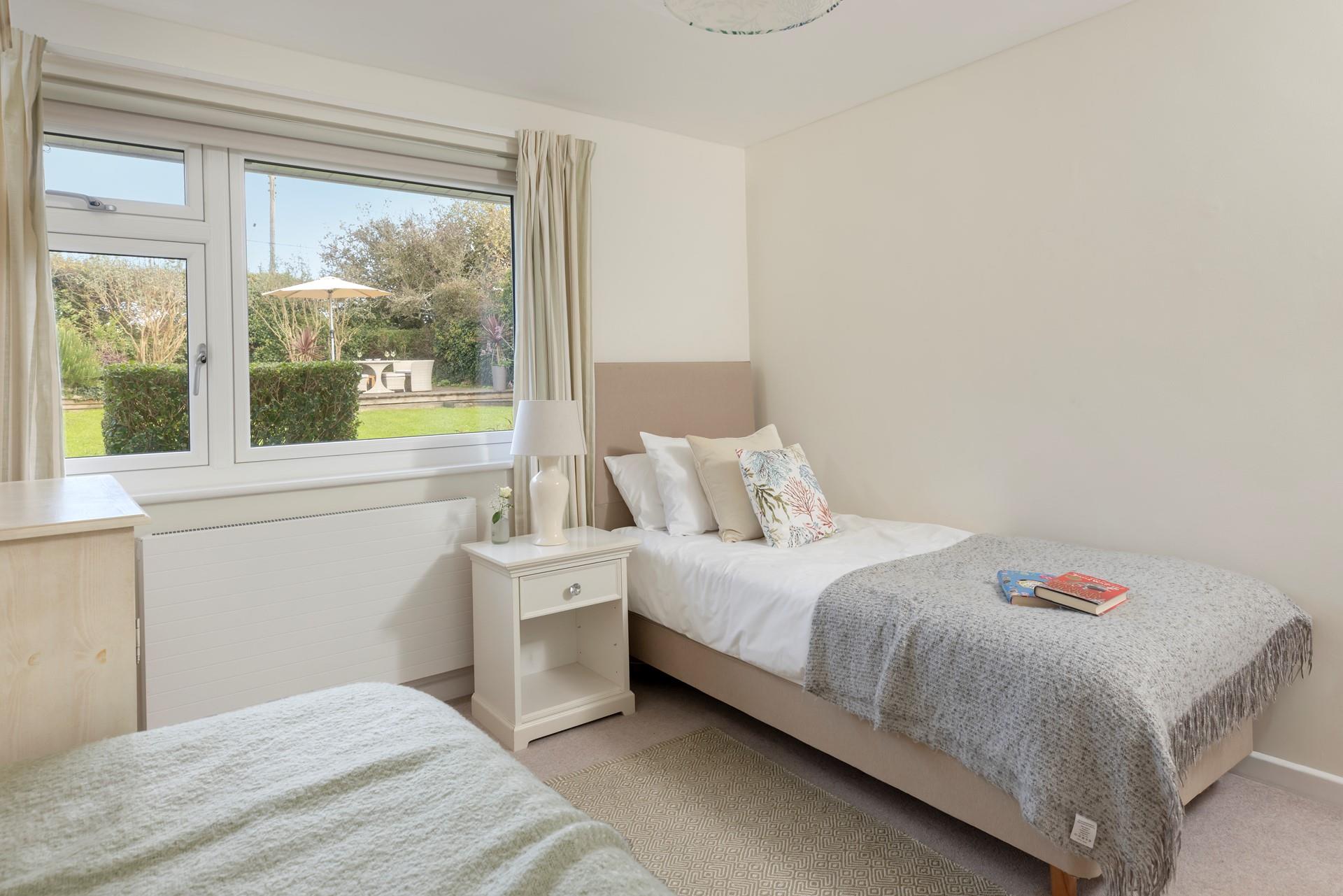 There are lovely views of the garden in bedroom 3.