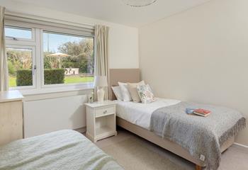 There are lovely views of the garden in bedroom 3.