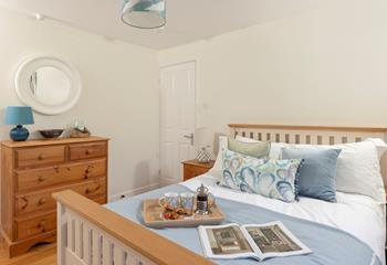 Calming tones of cream and blue feature in bedroom 4.