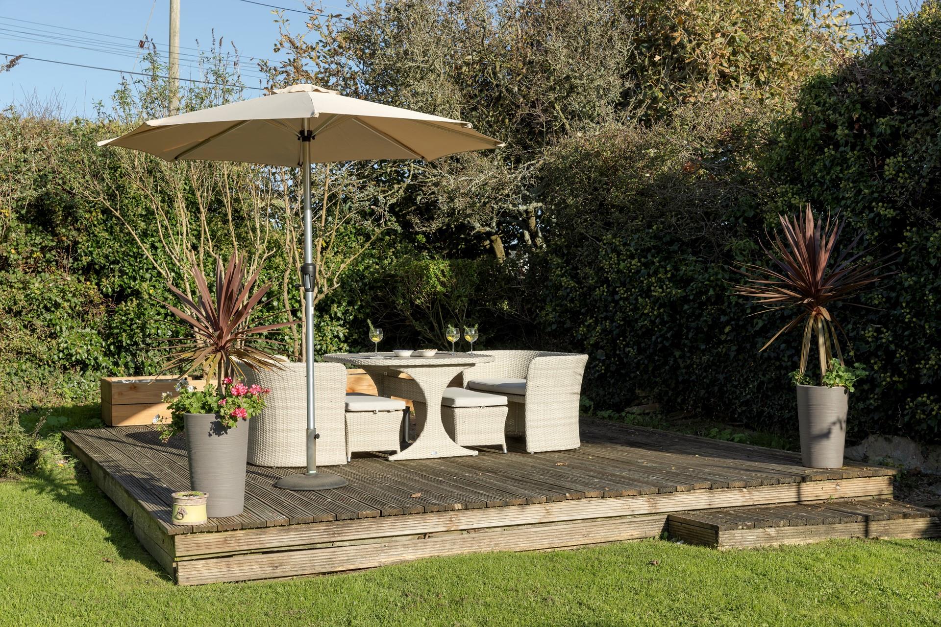 Enjoy the peaceful surroundings in this well established and very pretty garden.