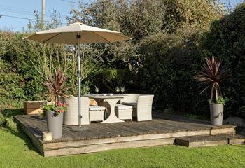 Enjoy the peaceful surroundings in this well established and very pretty garden.