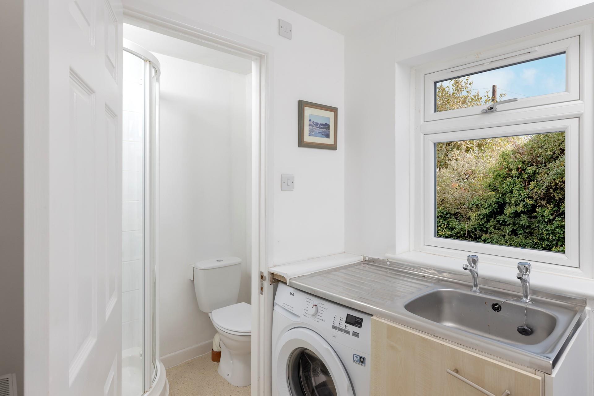 The utility has washing facilities and an additional shower room.