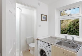 The utility has washing facilities and an additional shower room.