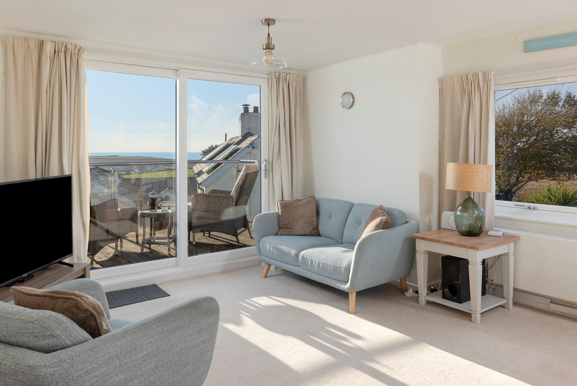 Put your feet up in the sitting room after a fun-filled day exploring Cornwall.