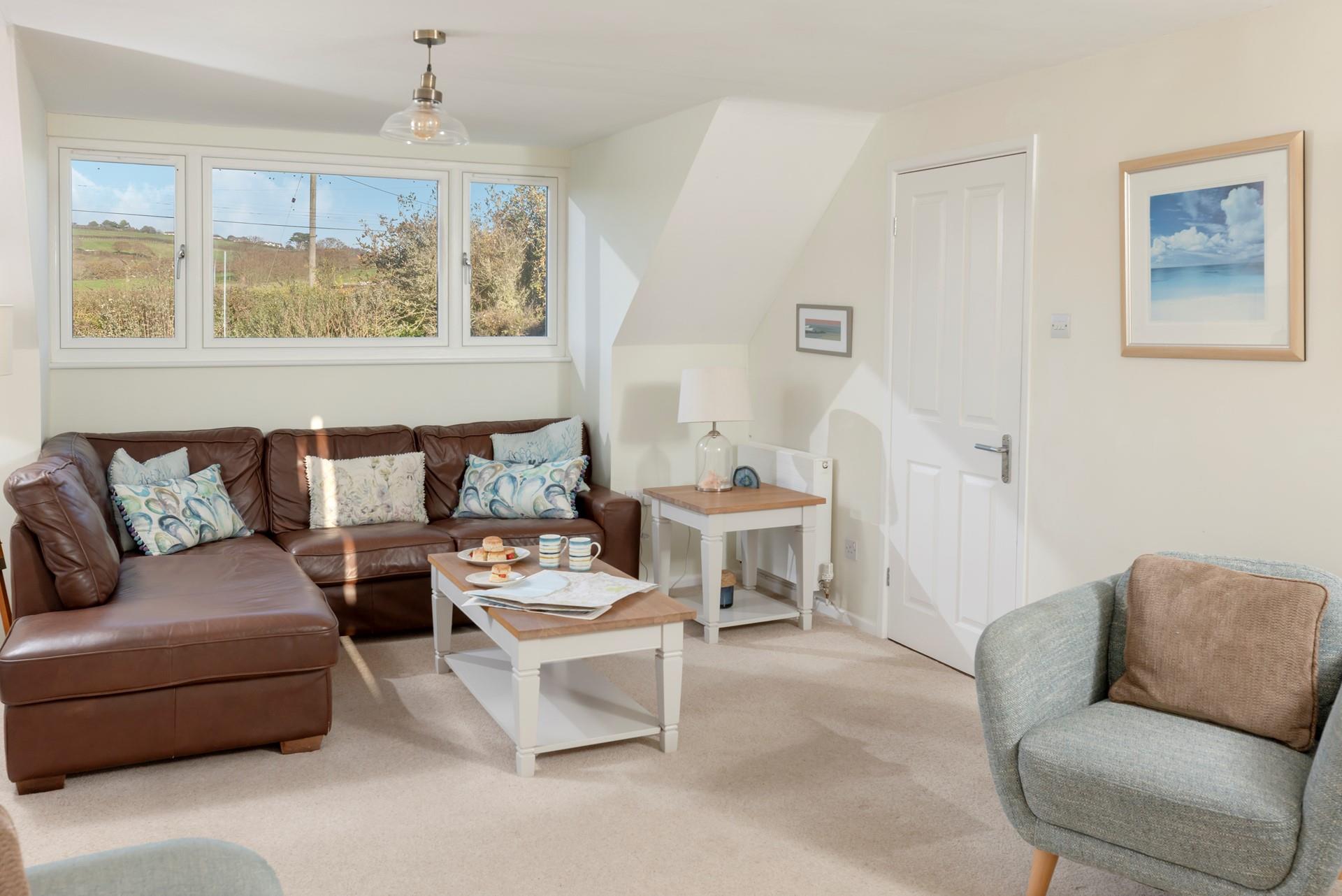 Put your feet up in the sitting room after a fun-filled day exploring Cornwall.