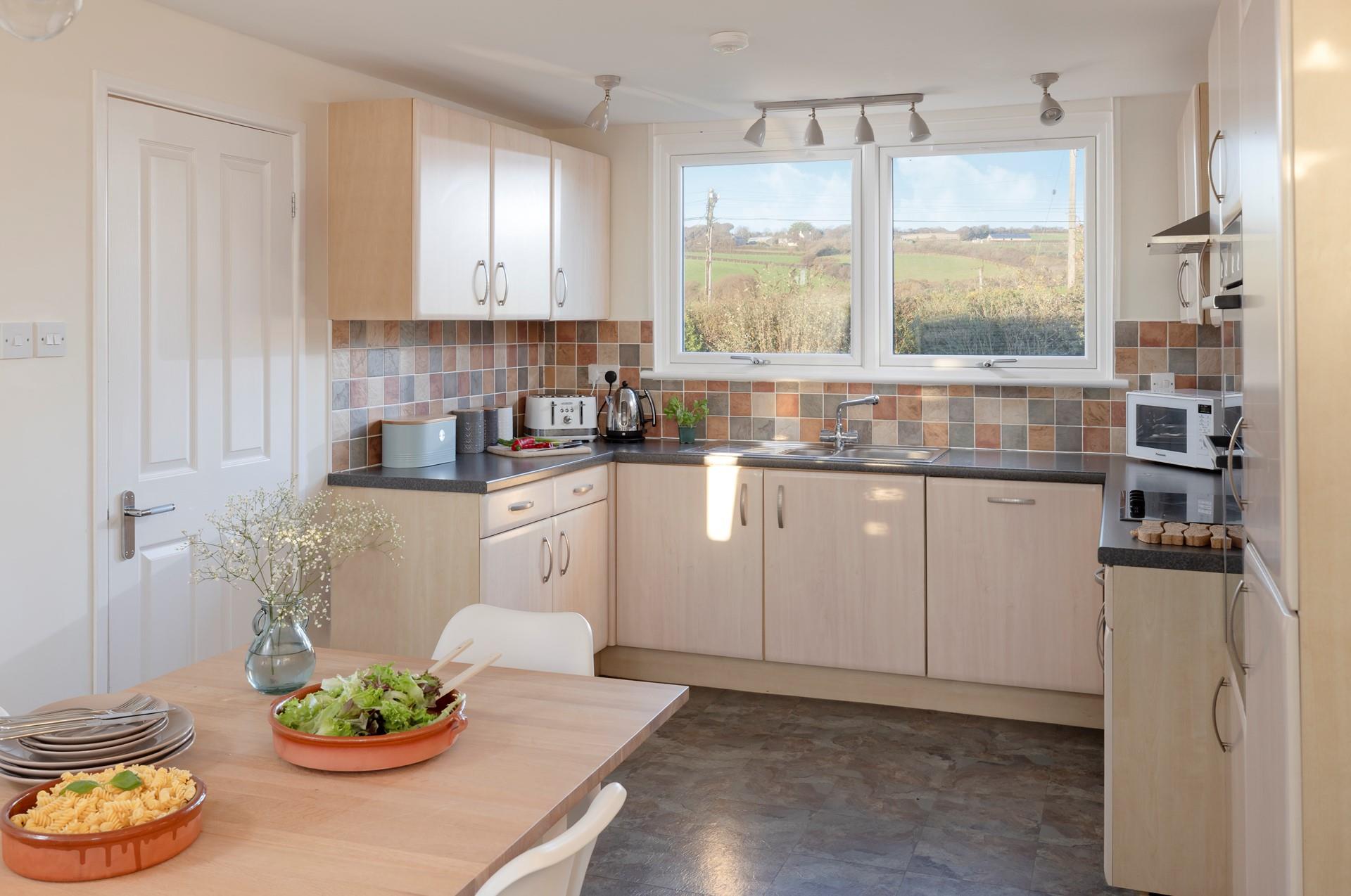 Grab some scones and local Cornish produce and tuck into a delicious meal.