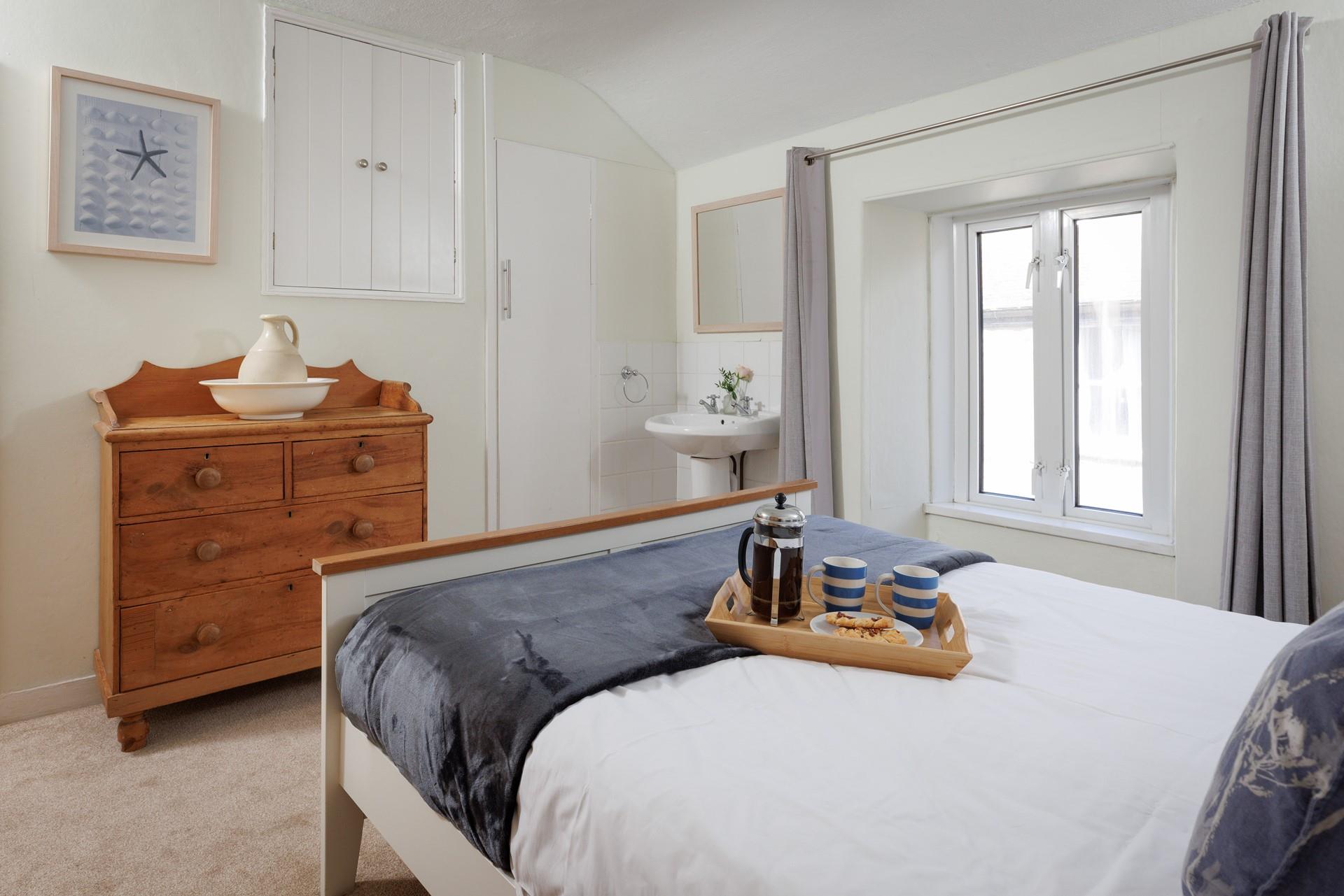 Classic furniture gives the bedroom a lovely warm and welcoming feel.