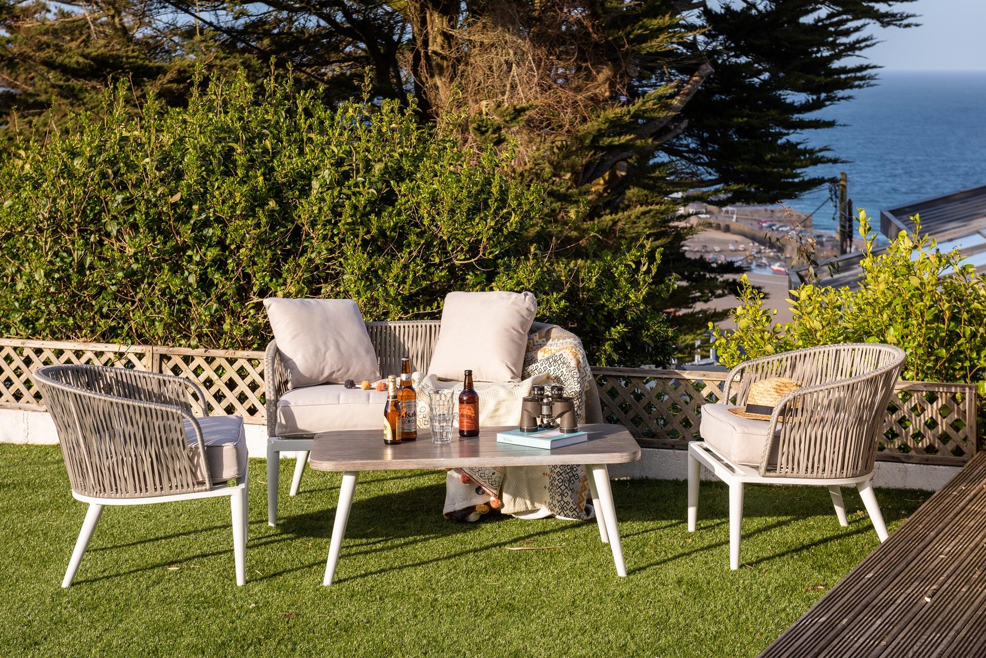 Wander back up from the beach and spend the rest of the day sunbathing in the sun trap garden.