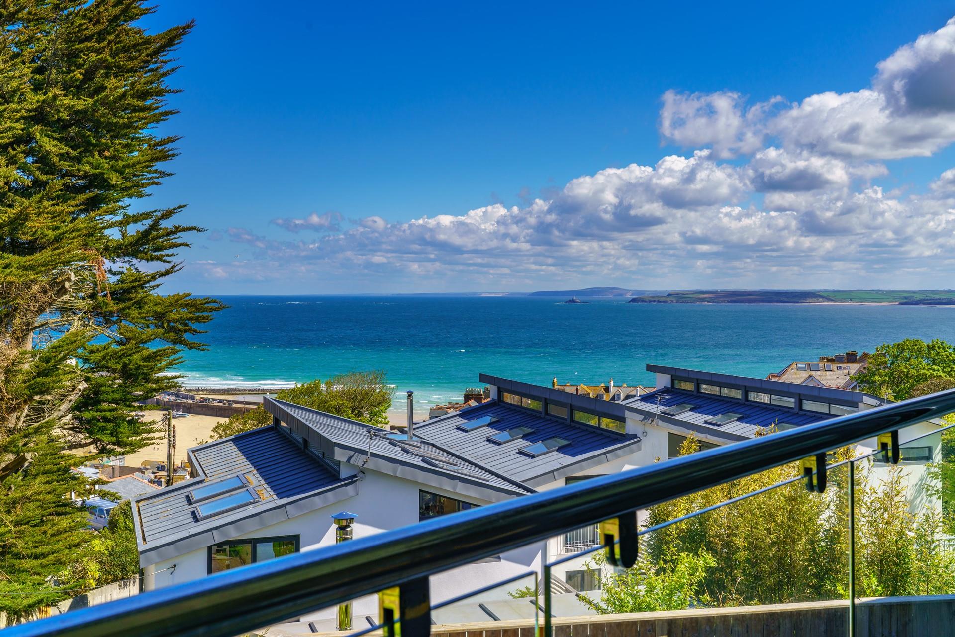 Dine al fresco on your balcony and look out towards Godrevy Lighthouse.