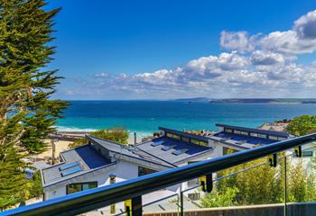 Dine al fresco on your balcony and look out towards Godrevy Lighthouse.