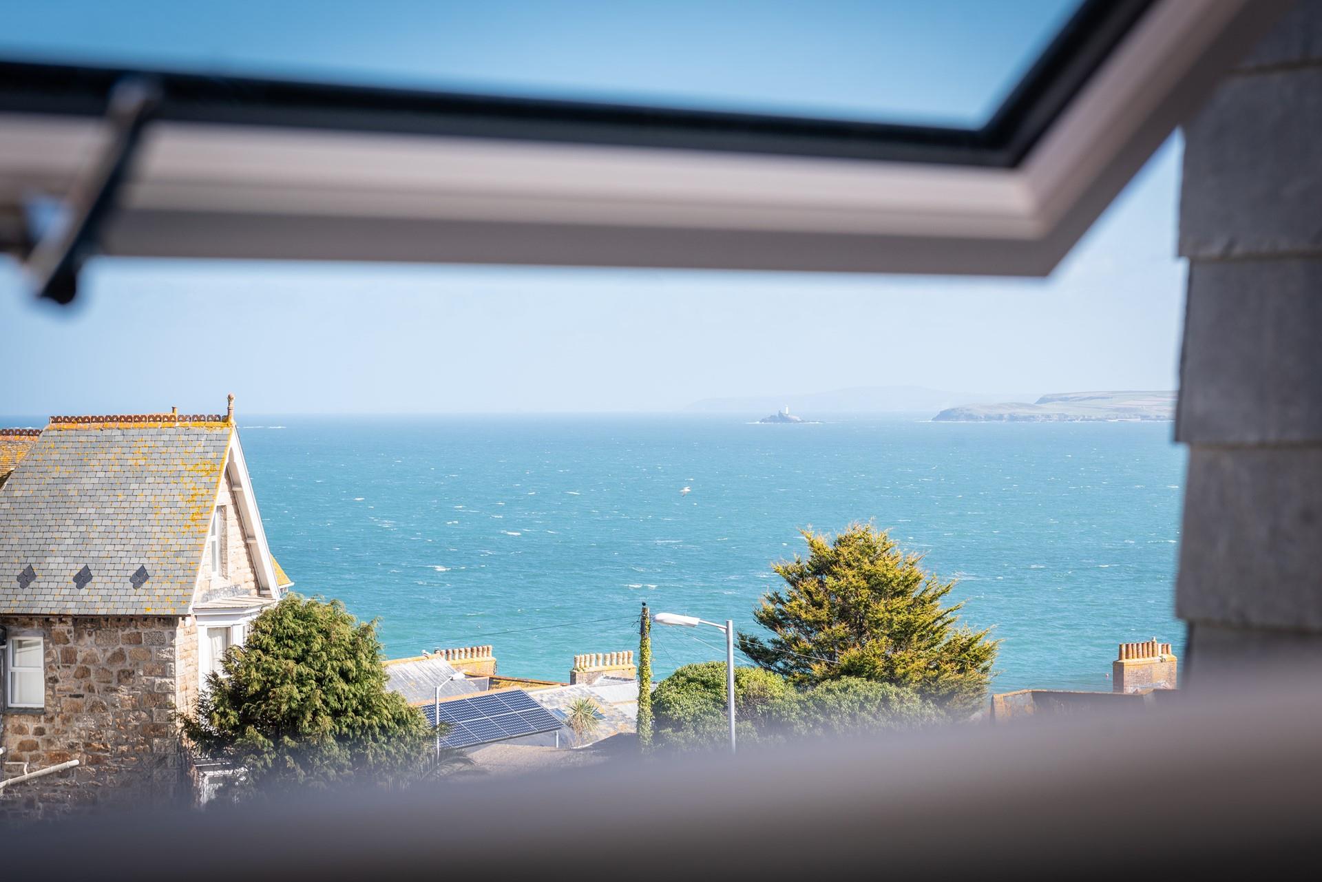 Open the window and breathe in the sea air.