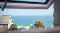 Open the window and breathe in the sea air.