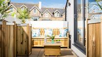 Unwind on the patio, a lovely sheltered area for sitting in the sun.