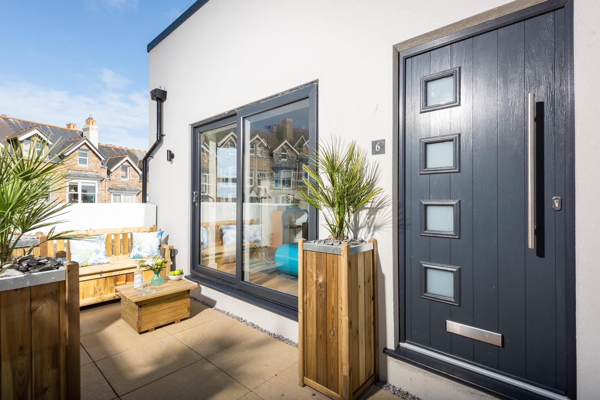 Sip a cold G&T in the warm afternoon sunshine on the patio area.