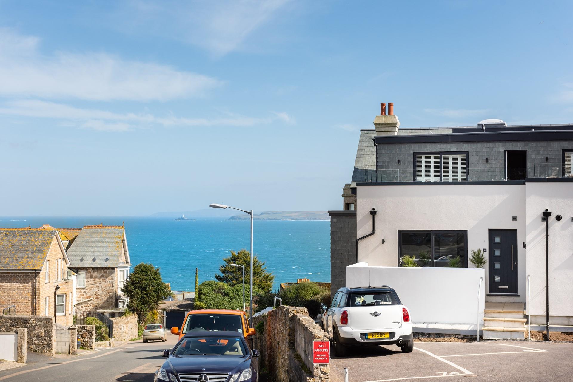 There is allocated parking just outside, just a few steps up and you are on the patio.