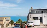 There is allocated parking just outside, just a few steps up and you are on the patio. - Thumbnail Image