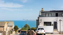 There is allocated parking just outside, just a few steps up and you are on the patio.