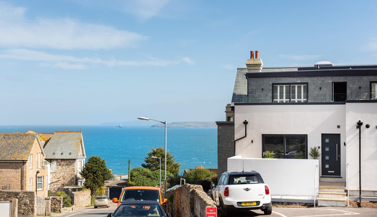 There is allocated parking just outside, just a few steps up and you are on the patio.